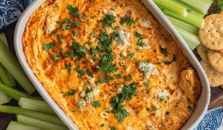 Healthy High Protein Buffalo Chicken Dip in a white baking dish