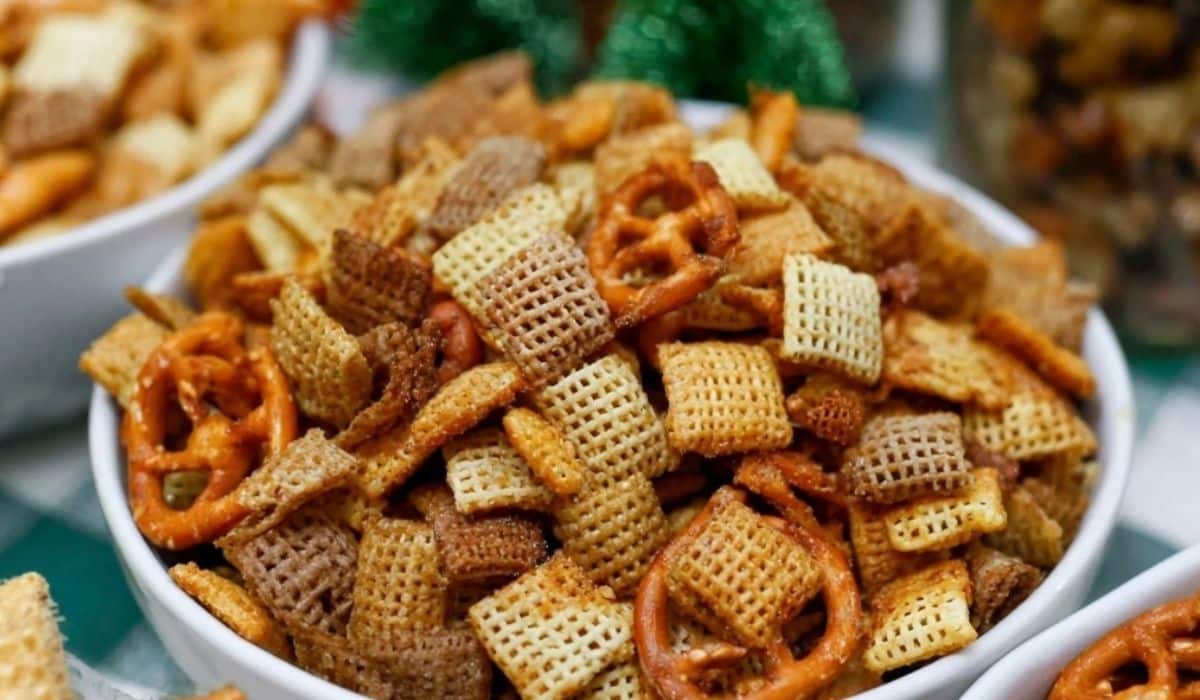 Extra Bold Savory Chex Mix in rustic wooden bowl