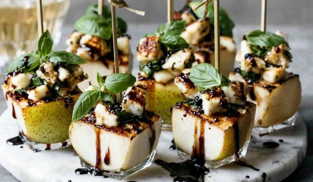 Pear & Brie Cheese Salad Skewers on rustic board