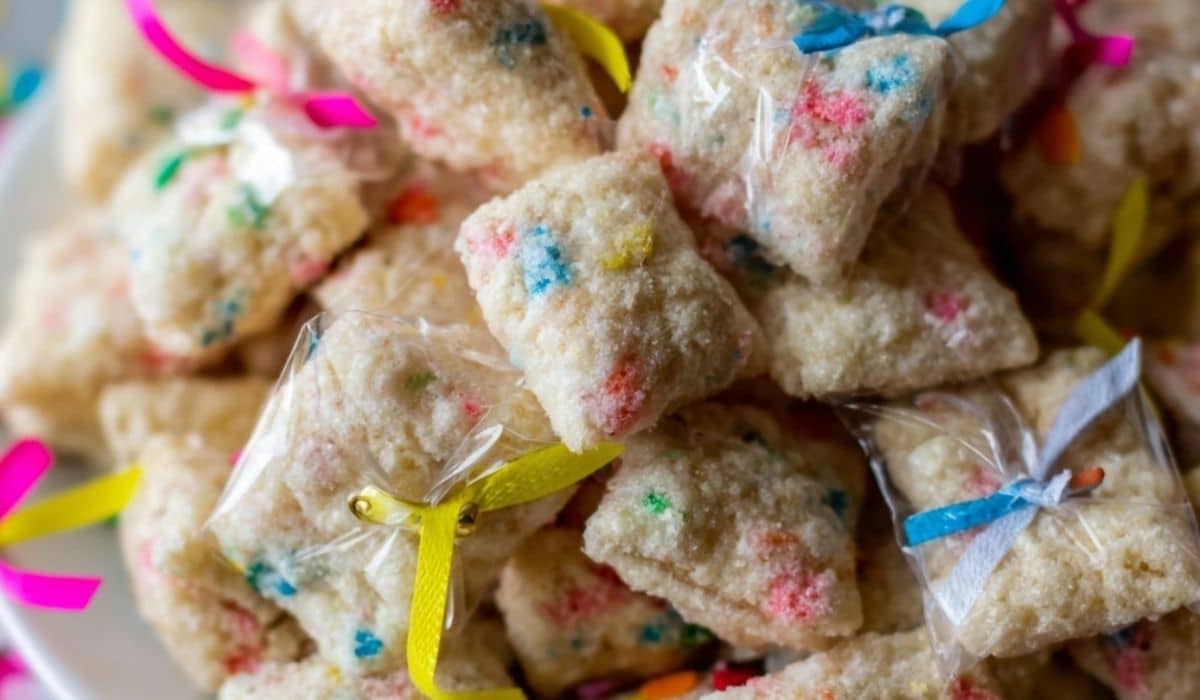 Cake Batter Puppy Chow in bowl with sprinkles