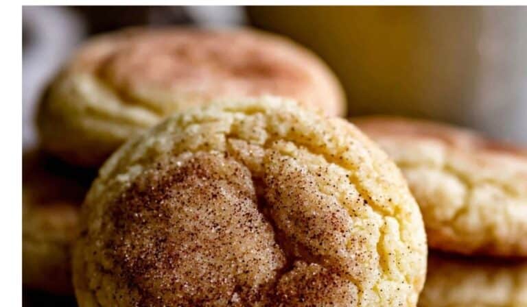 Soft Snickerdoodle Cookies stacked on rustic table