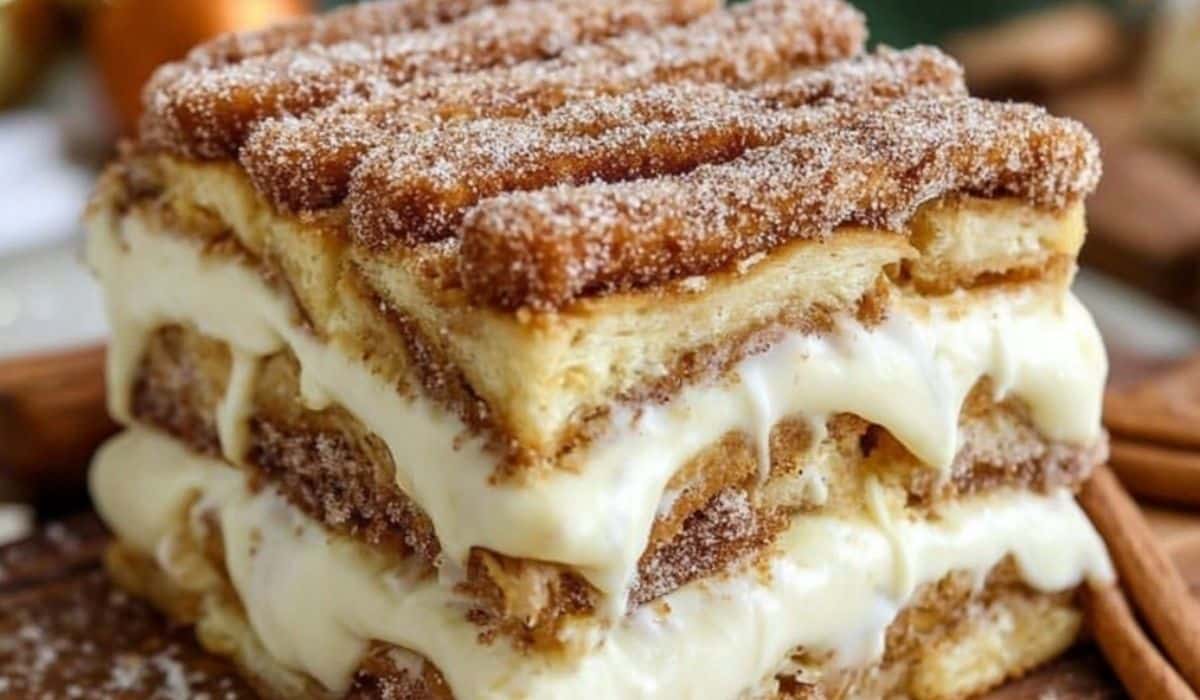 Churro Cheesecake squares served on dessert plate
