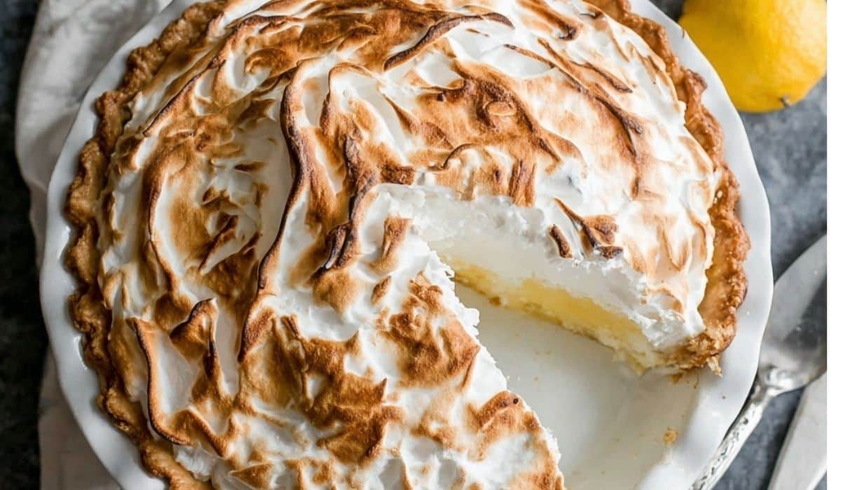 Classic Lemon Meringue Pie slice with golden meringue and lemon filling